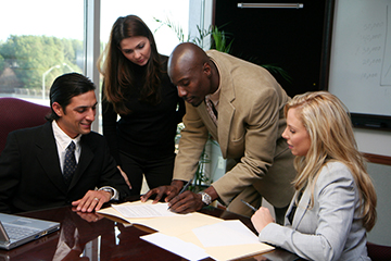 Business team signing contract Business team signing contract